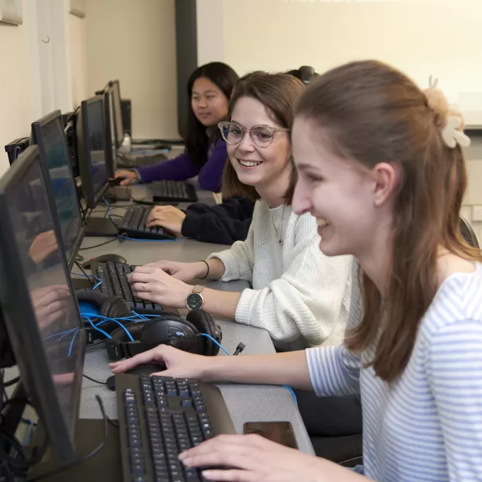 Students working on IELTS practice tests in the computer suite at the English language centre in Eastbourne.