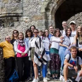 A group of ELC's English students are standing together in front of the castle in Lewes. Lewes is a pretty country town just inland and not too far away from Brighton and Eastbourne. Well worth a visit.
